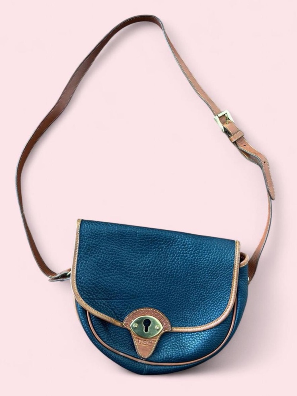 Dooney & Bourke Navy Blue Leather Crossbody Bag with Tan Trim